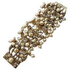 Vintage Very wide articulated gilt and baroque pearl bracelet, M Haskell, USA, 1960s