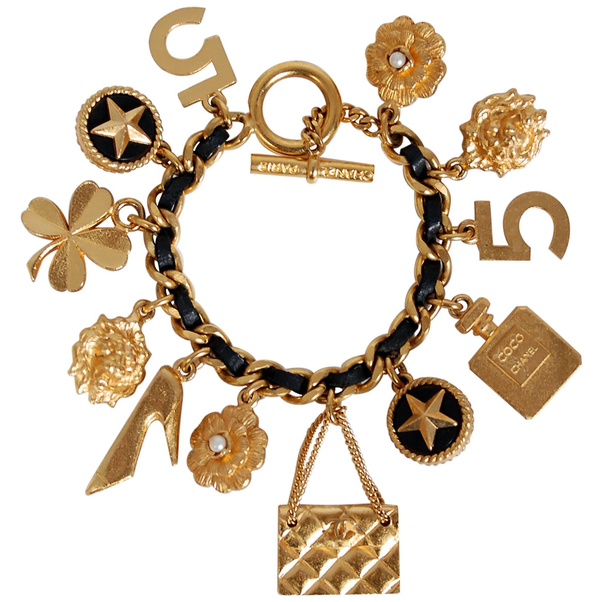 1995 Chanel Gold and Black Woven Leather Novelty Logo Medallion Charm Bracelet
