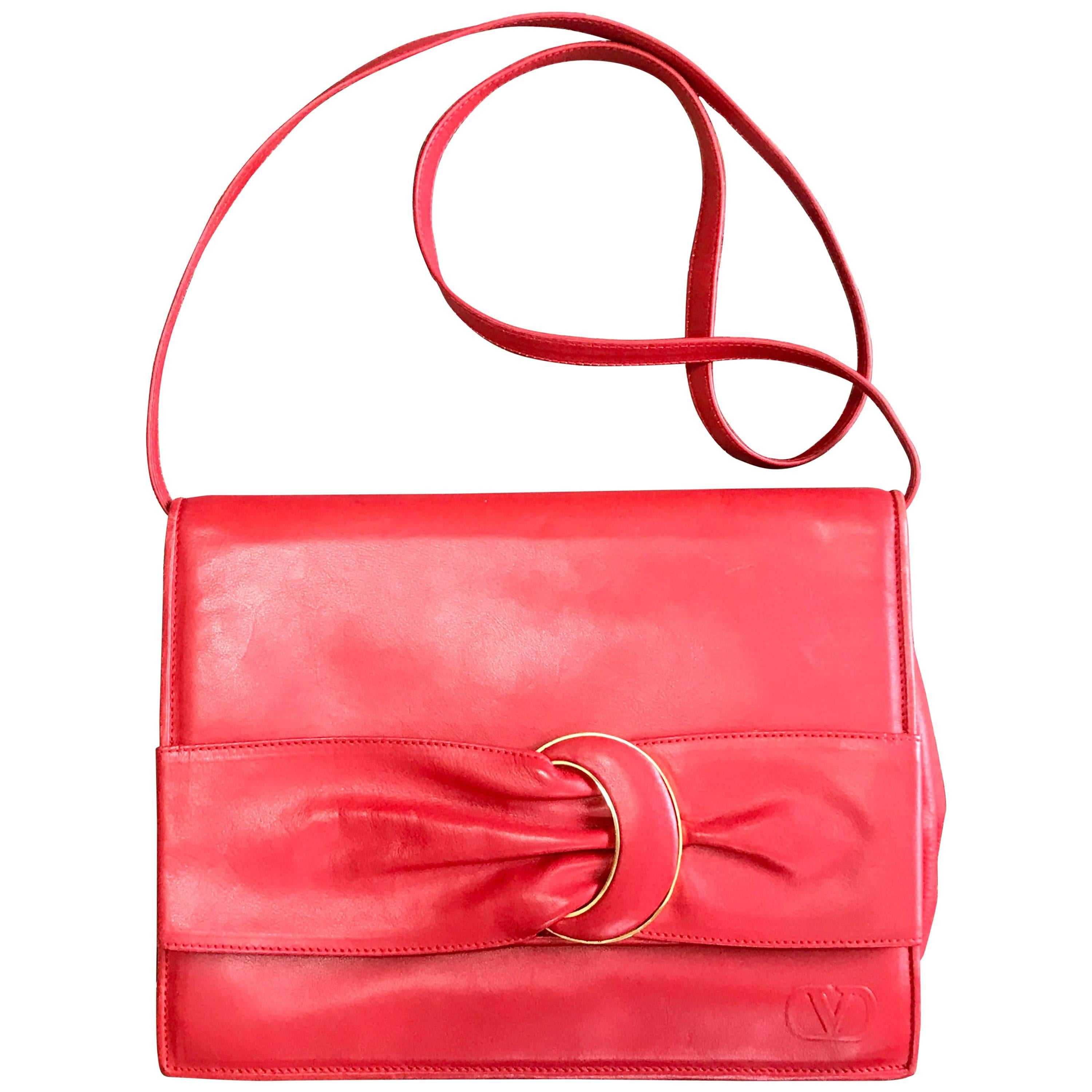 Vintage Valentino Garavani orange red leather clutch shoulder bag with buckle. For Sale