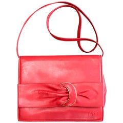 Vintage Valentino Garavani orange red leather clutch shoulder bag with buckle.