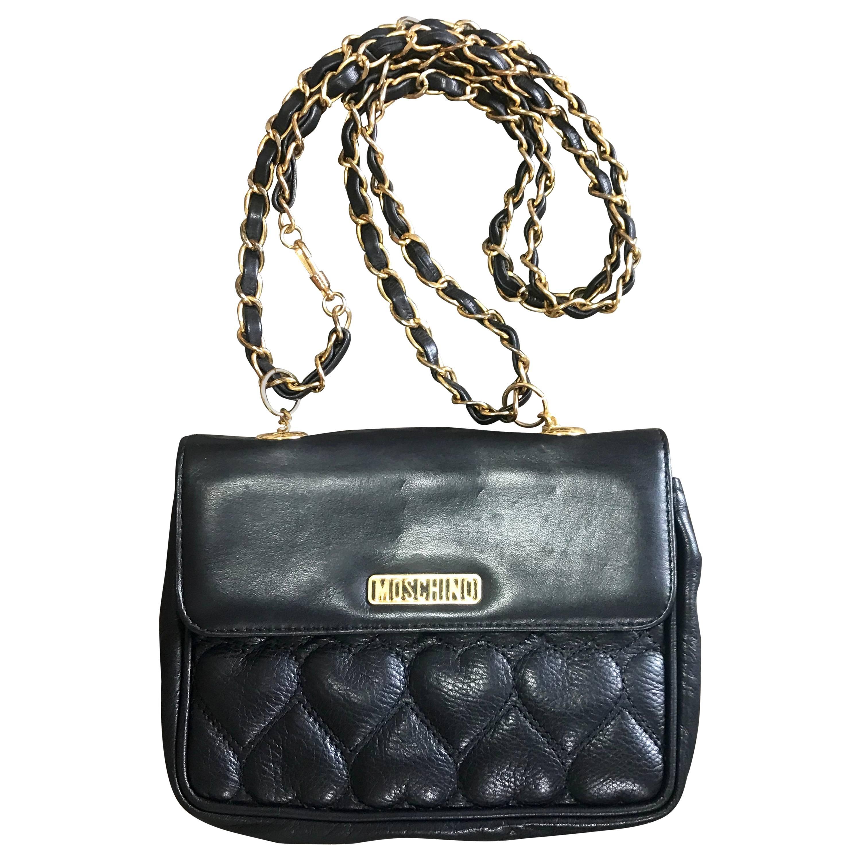 Vintage MOSCHINO black heart shape stitch shoulder bag, fanny pack with chains.
