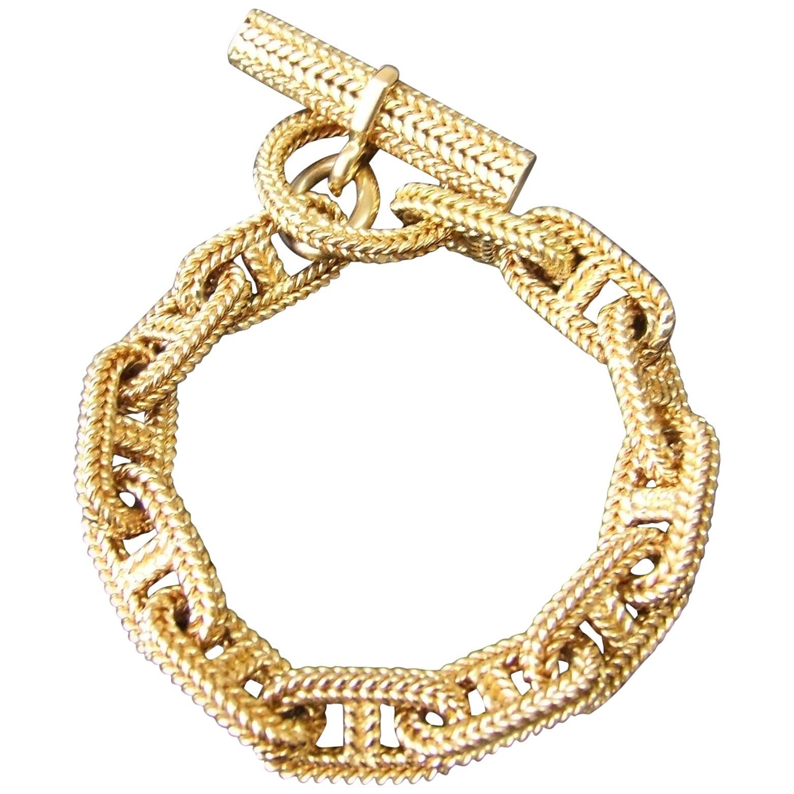 Amazing Authentic Hermès Bracelet

By Georges LENFANT

Pattern: Chaine d'Ancre

Made of Yellow Gold 750 (18K)

Composed of 12 links and one toggle closure

