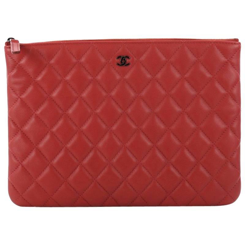Chanel Quilted Lambskin Medium O Case Clutch 
