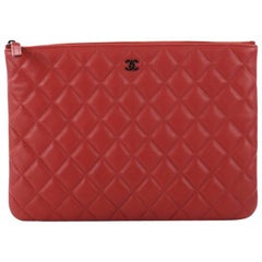 Chanel Quilted Lambskin Medium O Case Clutch