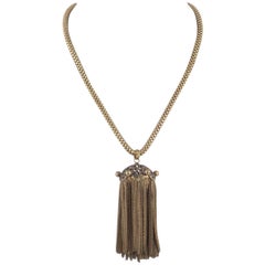  Brass tassle pendant on a circular box construction brass chain, 1940s