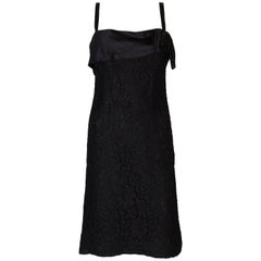 A Vintage 1960s chic Black heavy Lace Cocktail Dress