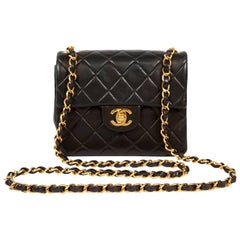 Vintage Chanel Black Lambskin Mini Classic Flap Bag