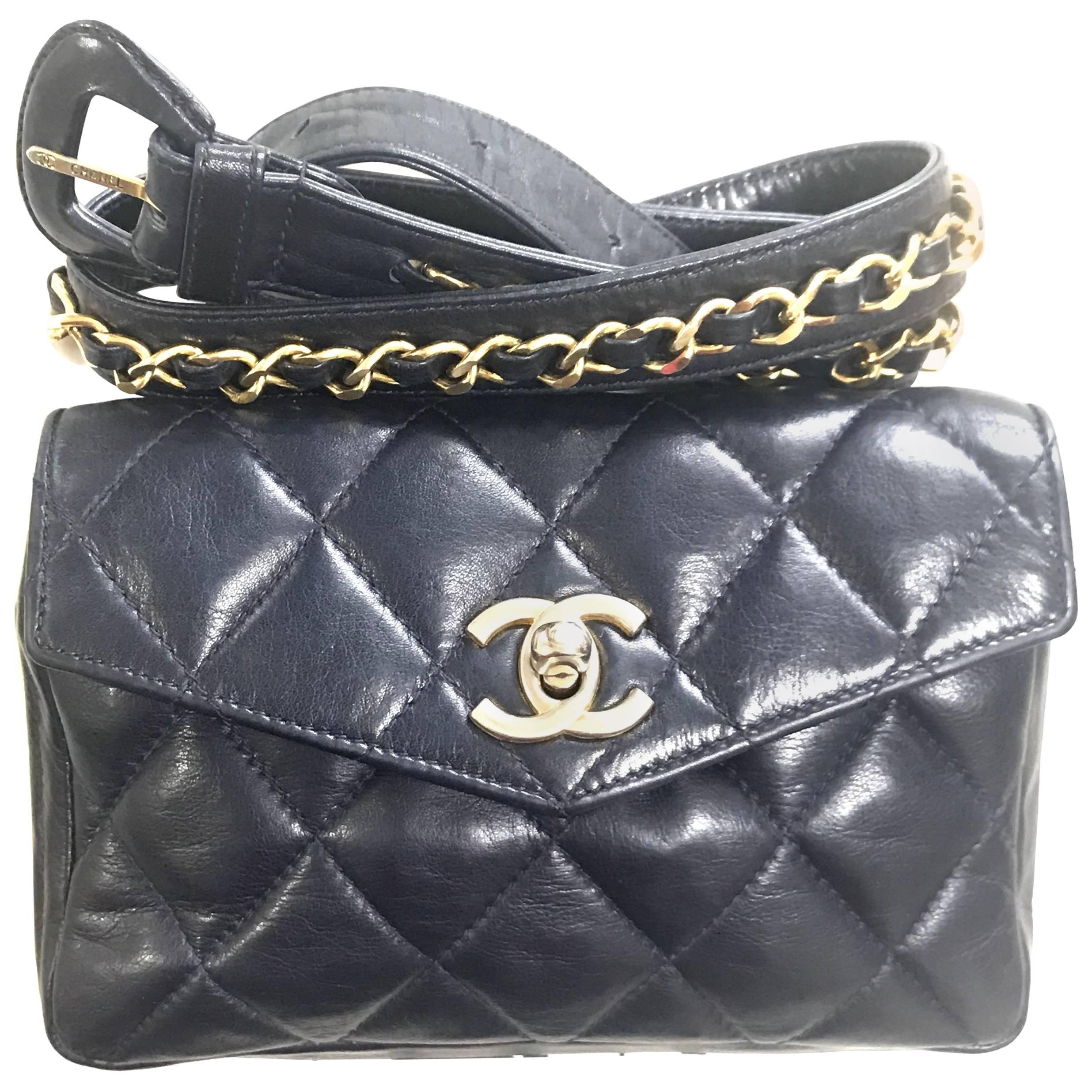 Chanel Vintage navy lamb waist bag fanny pack with golden chain belt and CC. For Sale