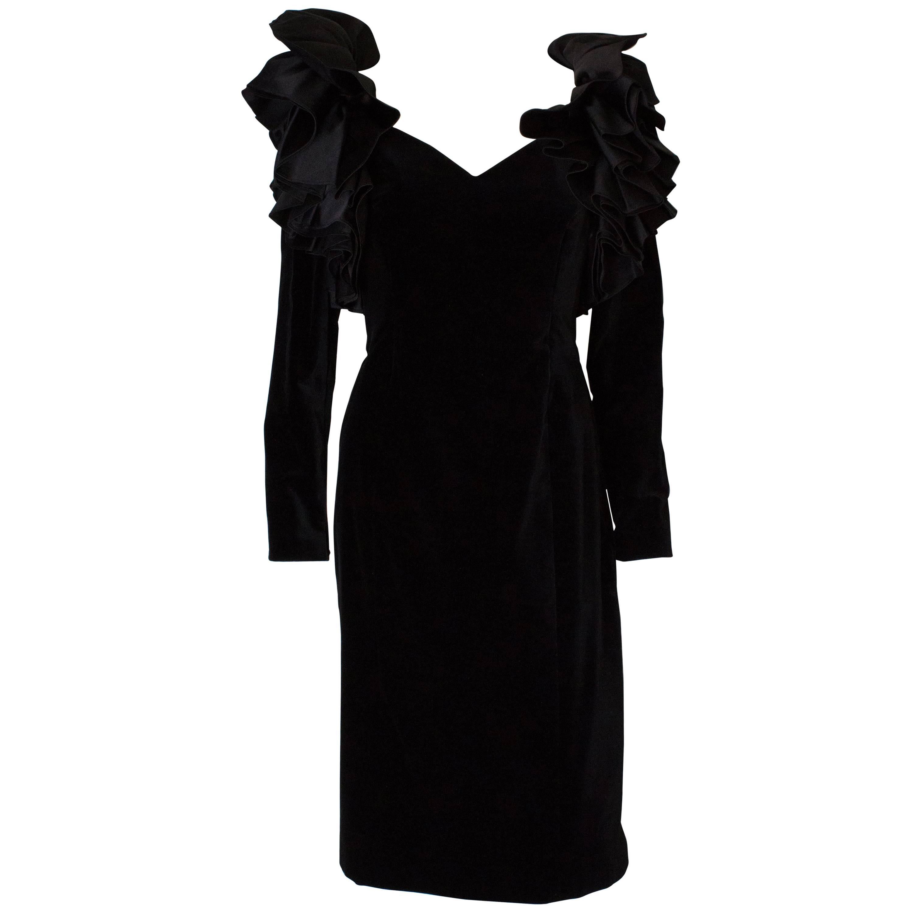 A Vintage 1980s dramatic sleeve black cocktail dress by Gina Fratini  For Sale