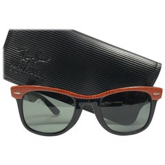 Nuovi occhiali da sole Ray Ban Wayfarer in pelle arancione G15 con lenti grigie USA anni '80