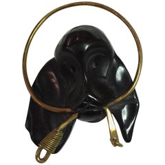 1930s Figural Black Bakelite Dog with Brass Leash in Mouth Brooch Pin