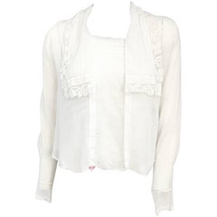 Blusa blanca hecha a mano con encaje y trabajo de tiro, finales de la década de 1910