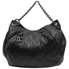 CHANEL Messenger Bag in Aged Soft Gray Quilted Lambskin Leather