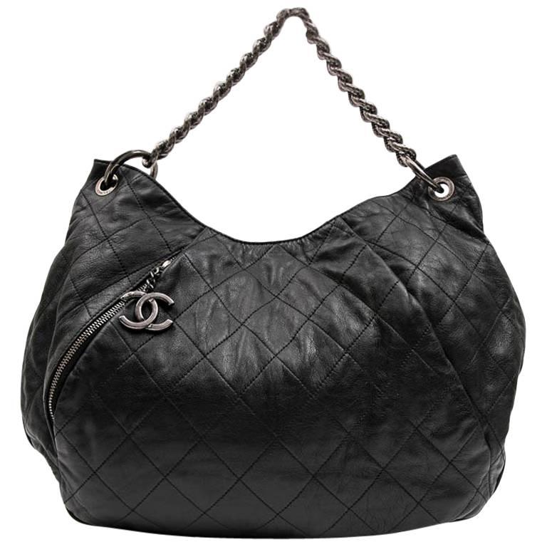 CHANEL Messenger Bag in Aged Soft Gray Quilted Lambskin Leather at