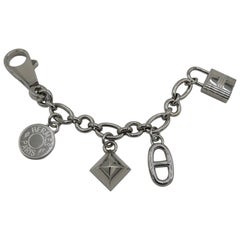 Hermès Hermes, Breloque bag charm in silver Silvery Metal ref.292215 - Joli  Closet