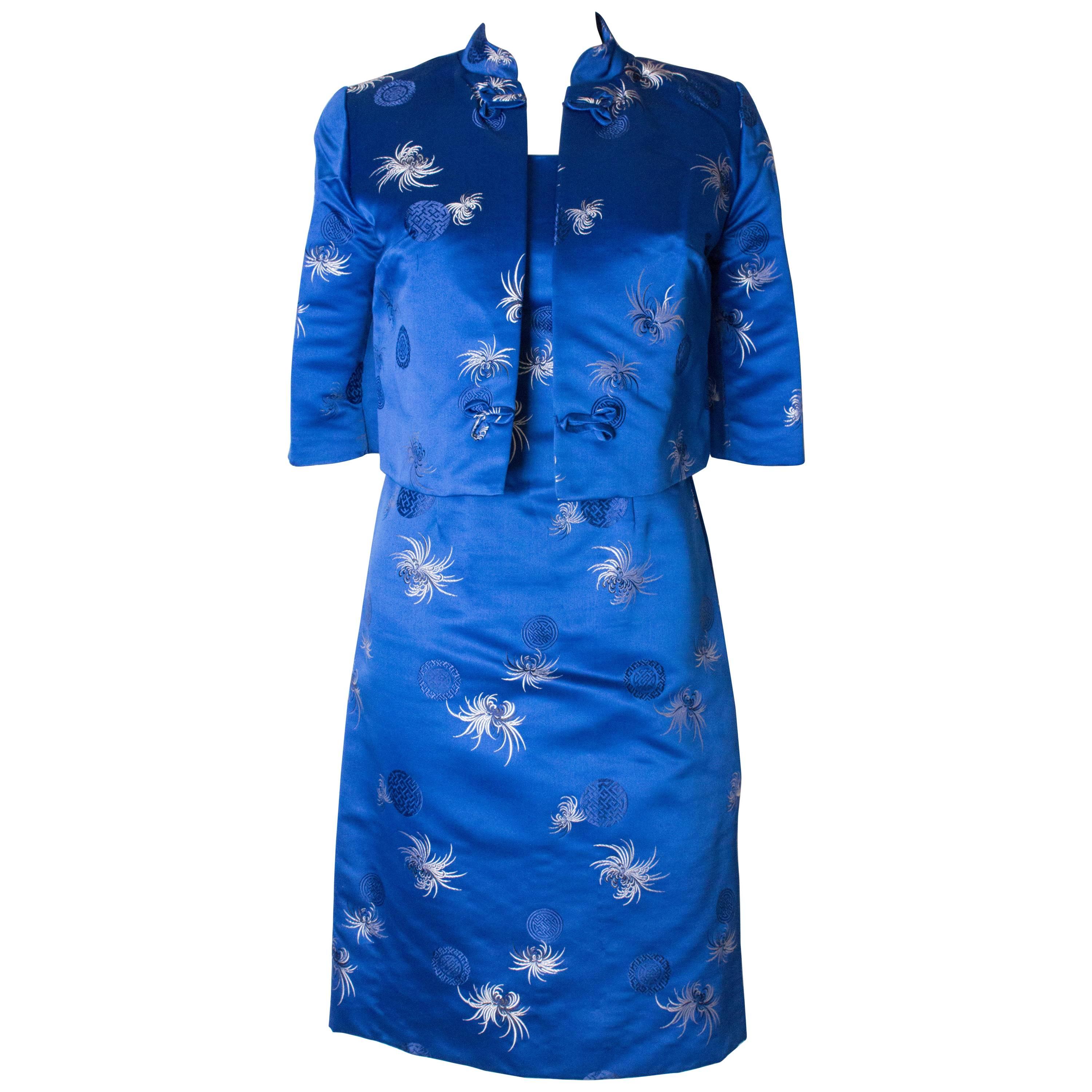 A Vintage 1960s chic two piece dress and jacket in a Royal Blue For