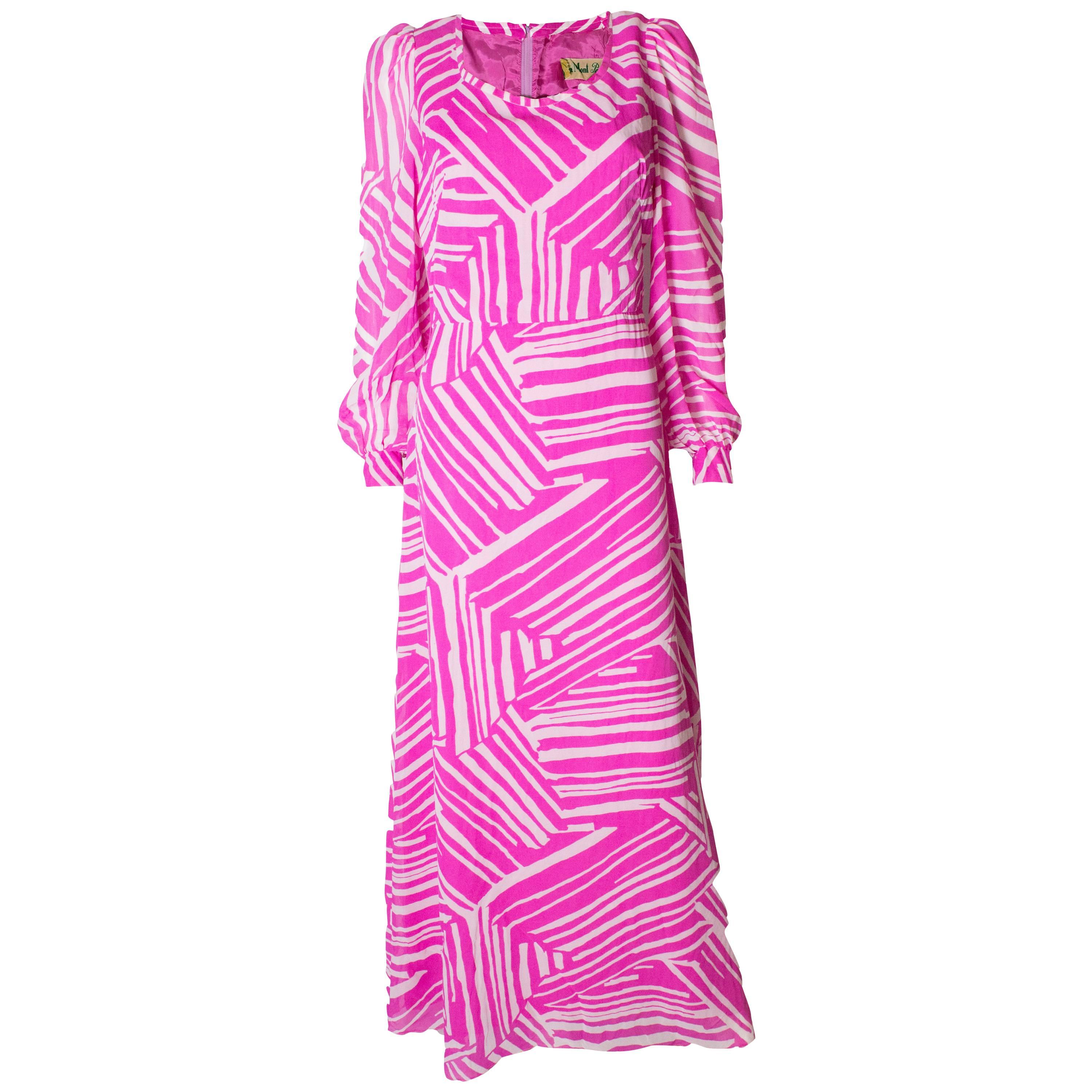 A Vintage 1970s abstract printed Pink and White evening Gown