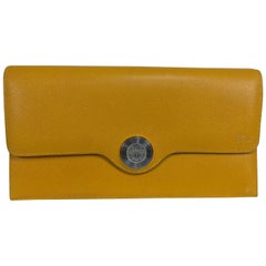 Hermes Mustard yellow pebbled leather clutch