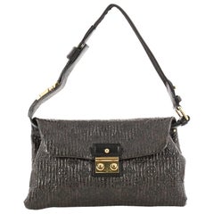 Louis Vuitton Motard Pochette Monogram Quilted Leather