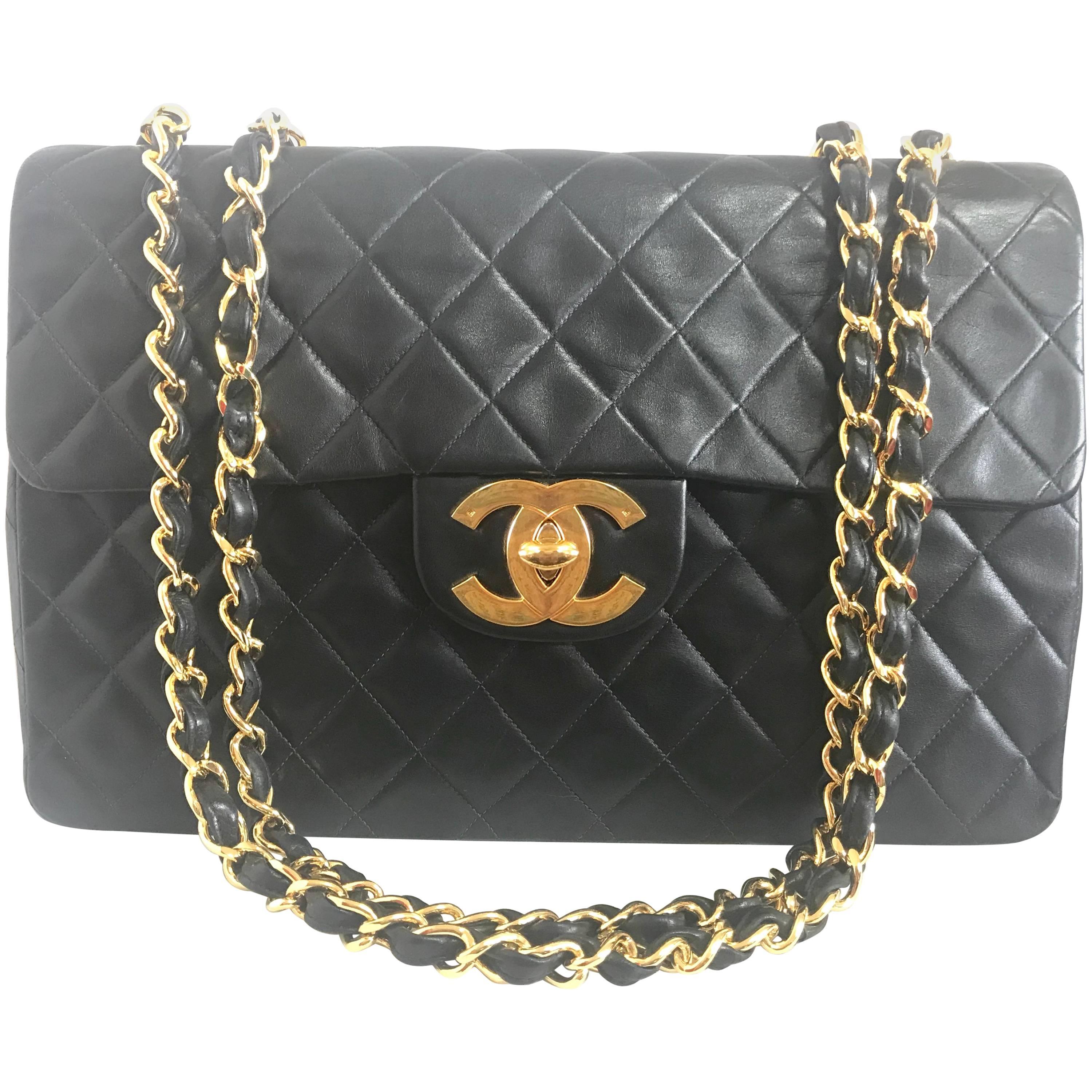 Vintage CHANEL black lamb leather large, jumbo classic flap 2.55 shoulder bag. For Sale