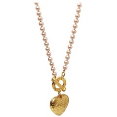 Givenchy pearl necklace with gold ring and heart pendant