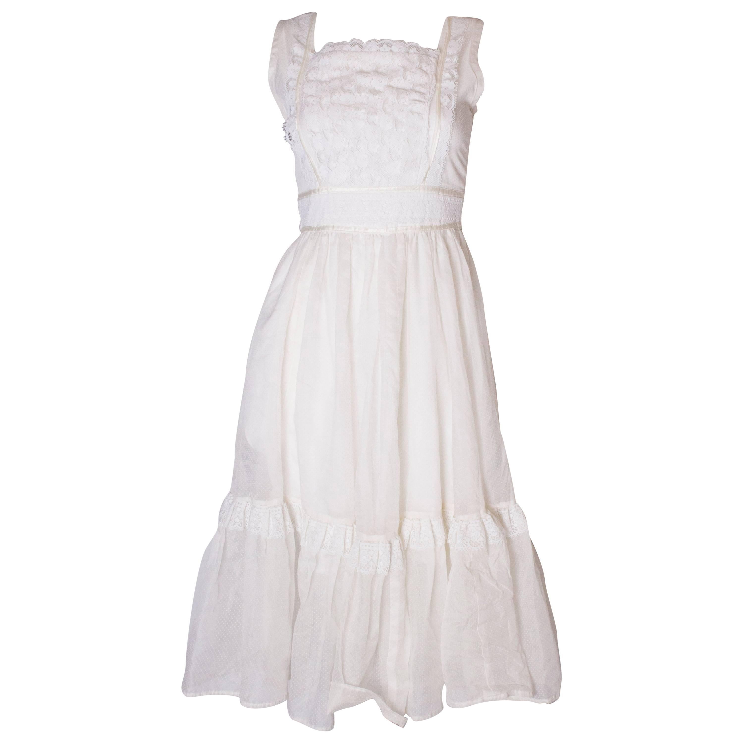 A vintage 1950s White Spotted and Lace summer Dress For Sale