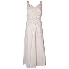 A Vintage 1970s cream evening dress by Maddison Avenue London 