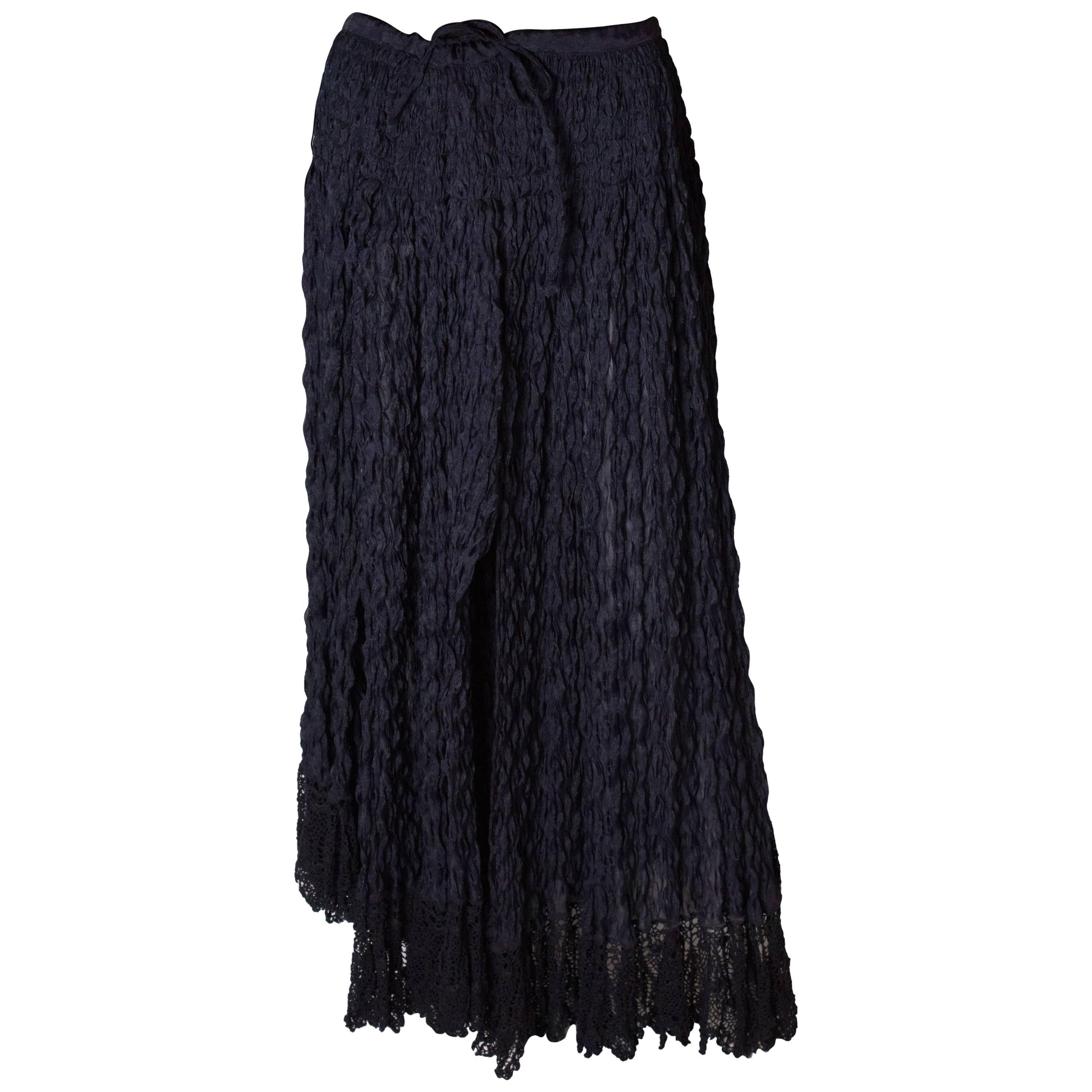 A Vintage 1990s dark navy long ruffle summer skirt by Romeo Gigli 