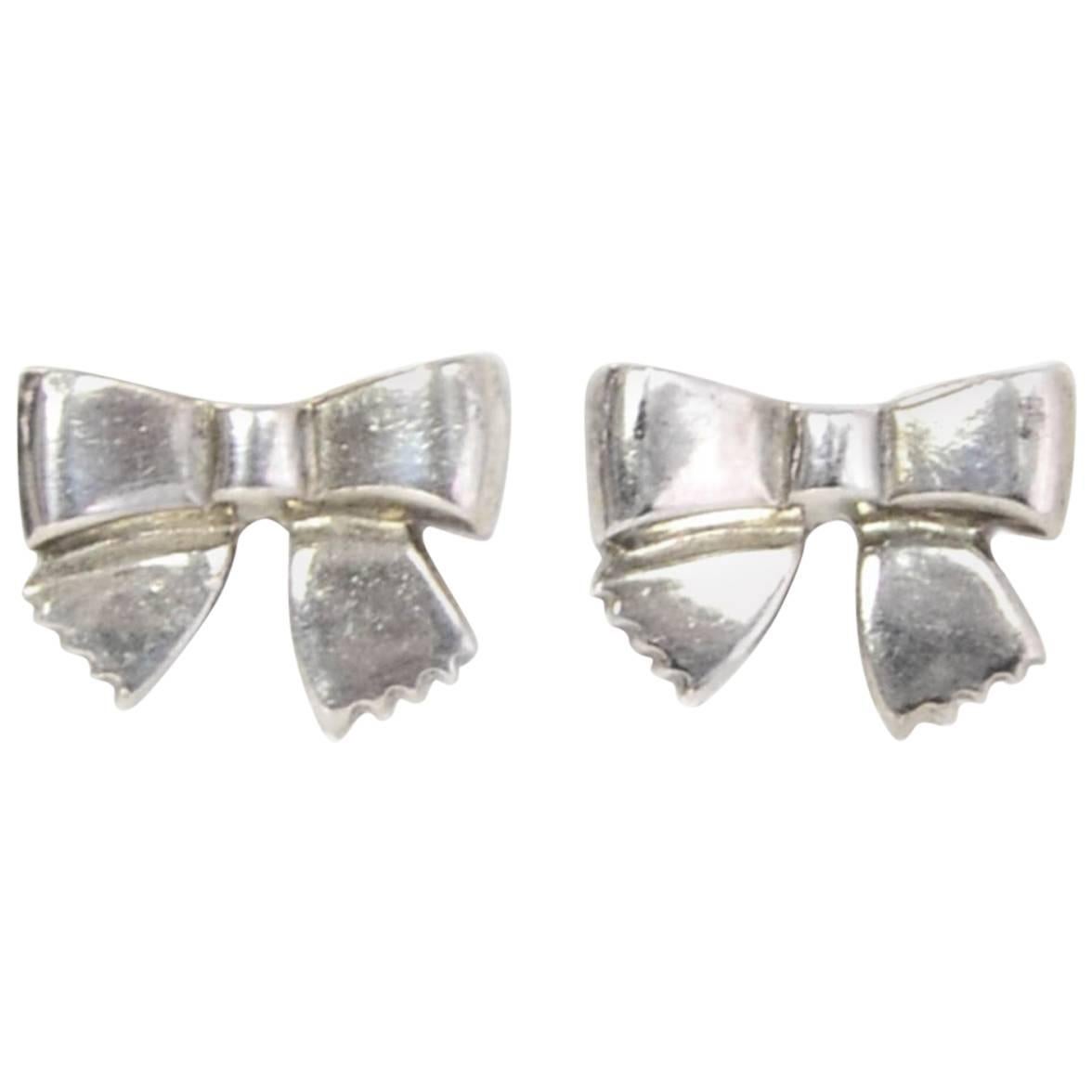 Chanel Sterling Silver Bow Stud Pierced Earrings