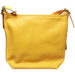 Coach large ladies yellow handbag duffle crossbody with dust cover and gold hard