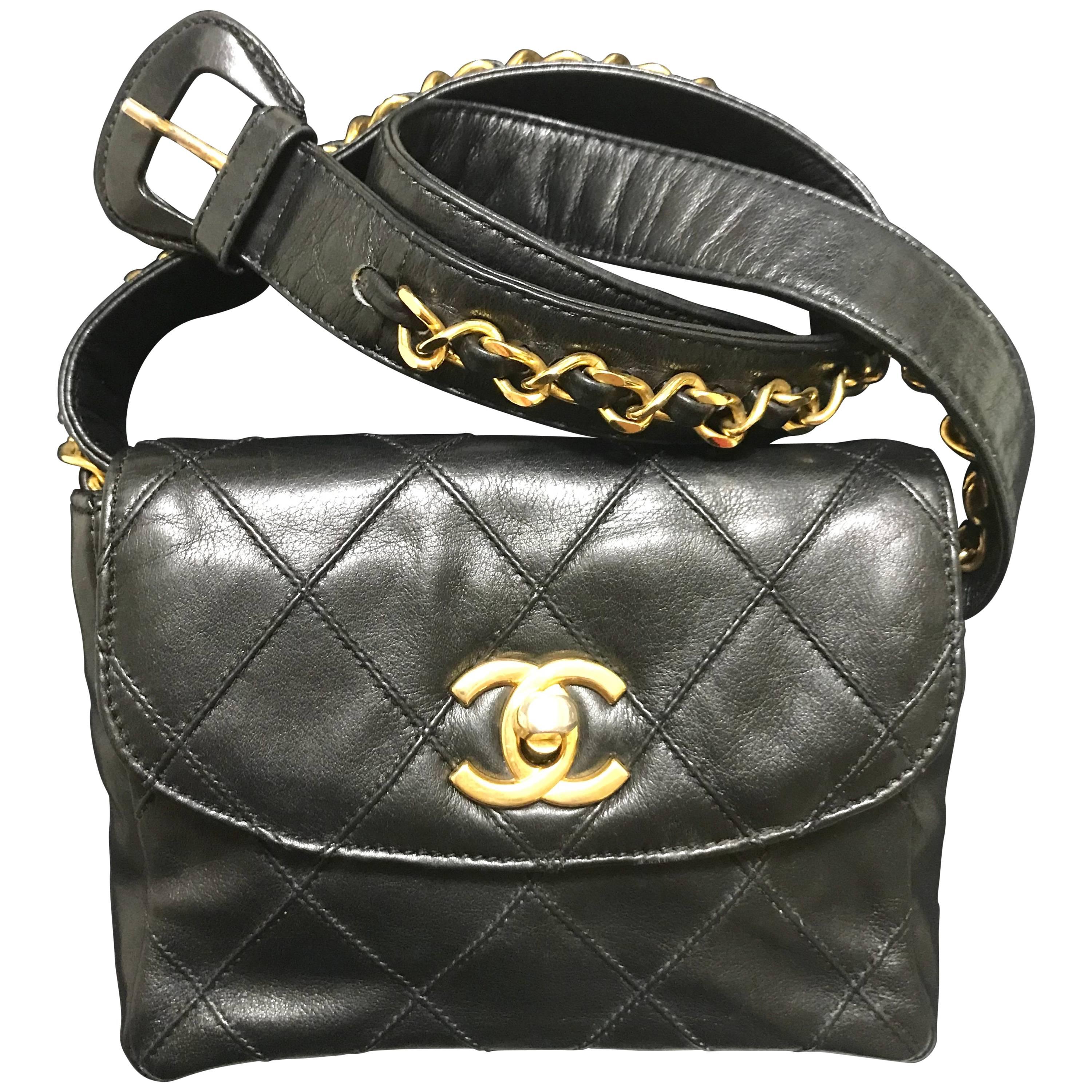 Vintage CHANEL black leather waist purse, fanny pack, hip bag with golden CC.