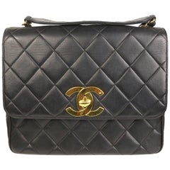 Vintage Chanel Classic Black Quilted Lambskin Gold Toned "CC" Flap Shoulder Bag