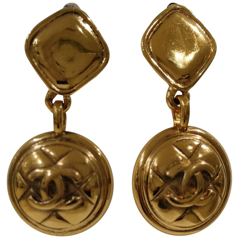 Chanel Gold tone rhombus CC logo pendant clip-on earrings at 1stDibs