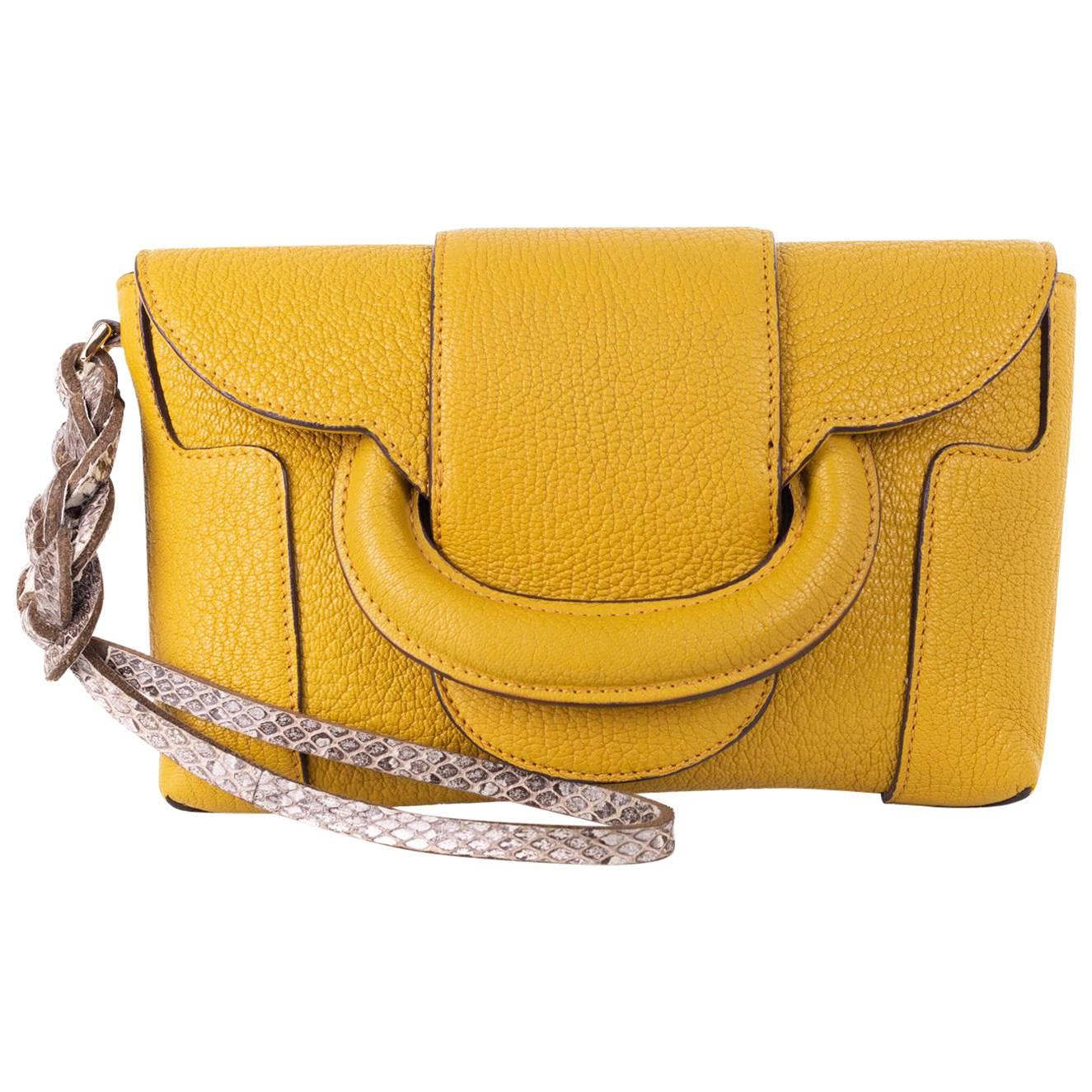 Roberto Cavalli Solid Mustard Yellow Grained Leather Wristlet Clutch For Sale
