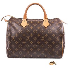 LOUIS VUITTON Speedy 30 Bag in Brown monogram Canvas and Natural Cow Leather