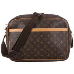 Pre loved authentic LOUIS VUITTON Monogram Reporter PM serial number  #SP0013 This messenger bag is crafted of iconic …