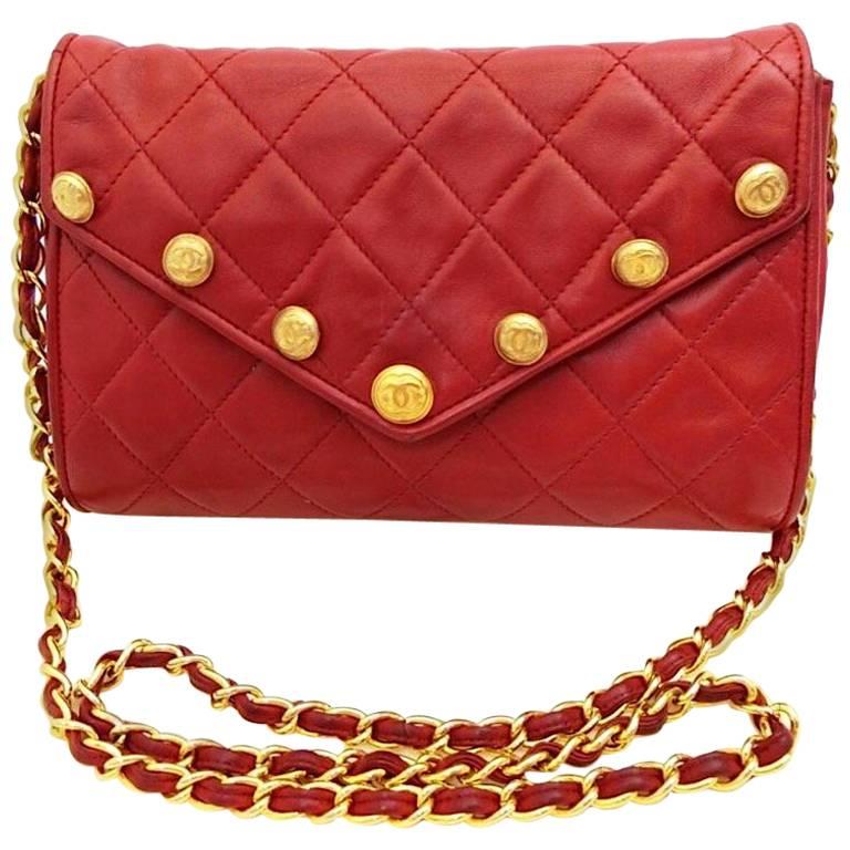 Chanel Vintage red lamb shoulder bag with golden CC button motifs at flap  For Sale