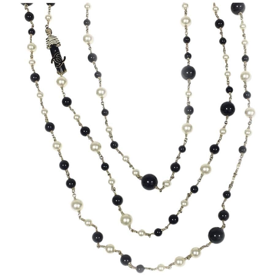 CHANEL Multi-Row Necklace in Black and White Pearls, CC and Coco Figurine
