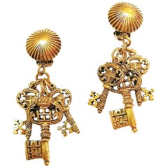 Antiqued gilt metal 'key' drop earrings, Selini, 1960s