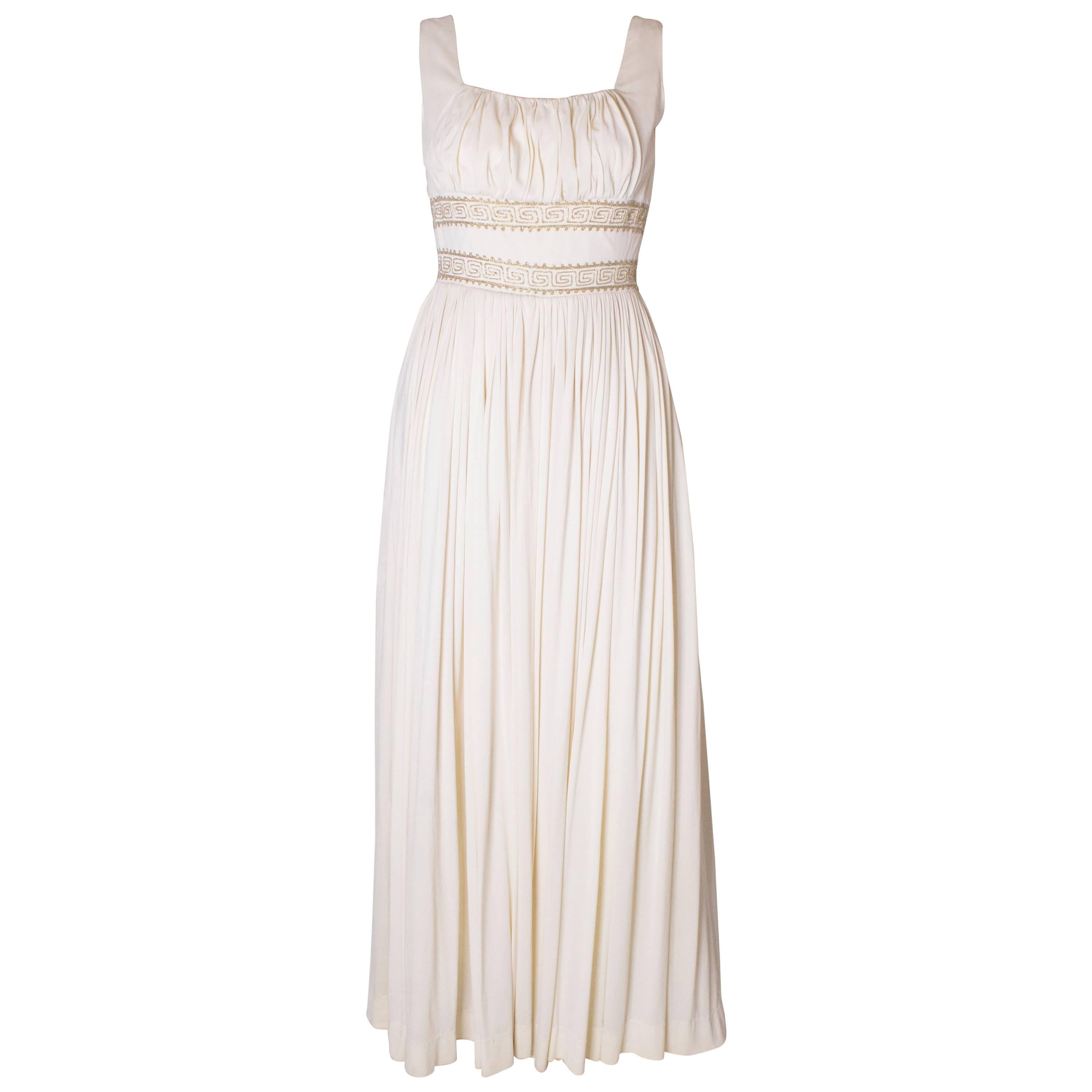 A Vintage 1970s white Grecian Style evening Gown