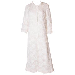 A Vintage 1960s White Ribbonwork summer Coat