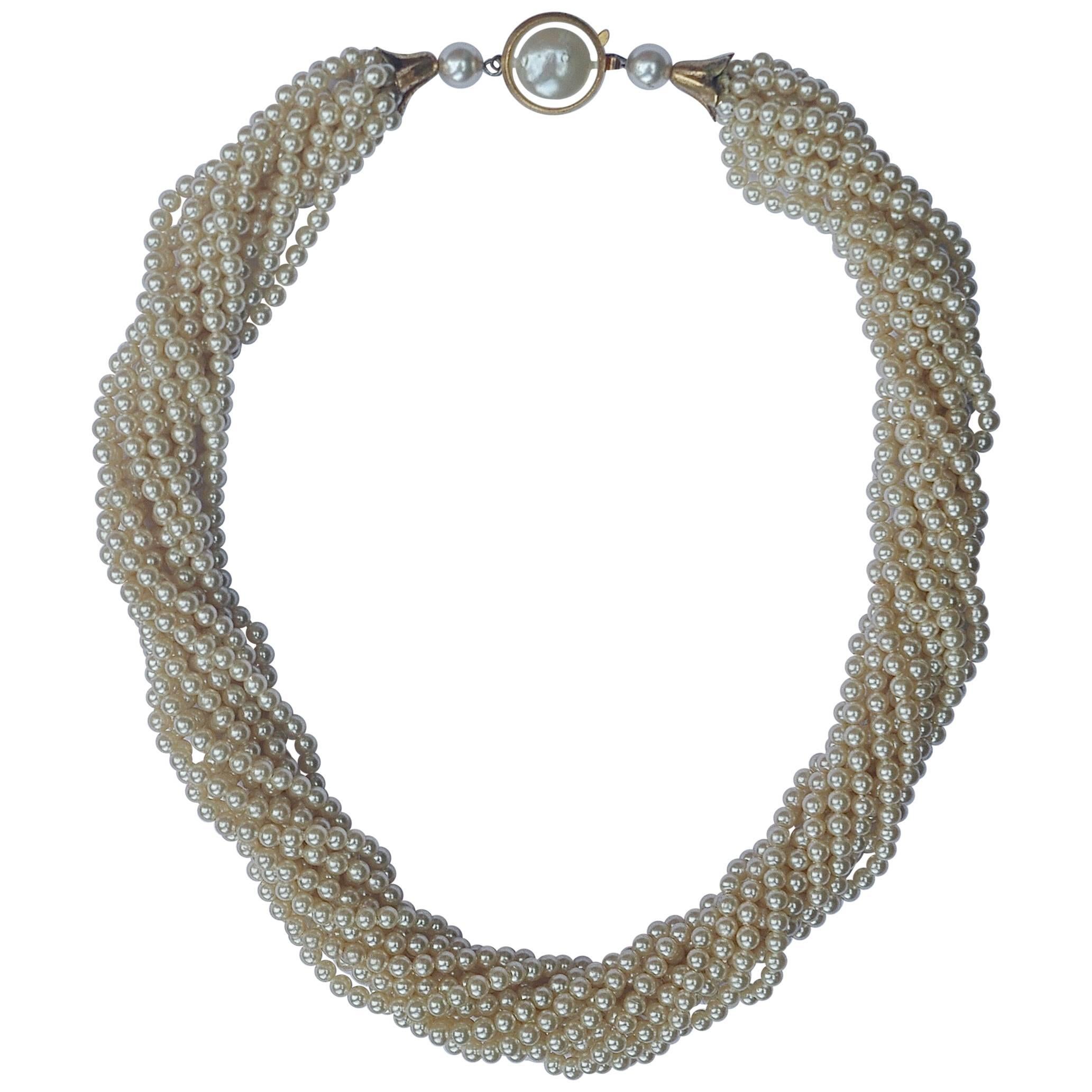 Twelve Strand Glass Pearl Necklace with a Gold Tone and Pearl Clasp at