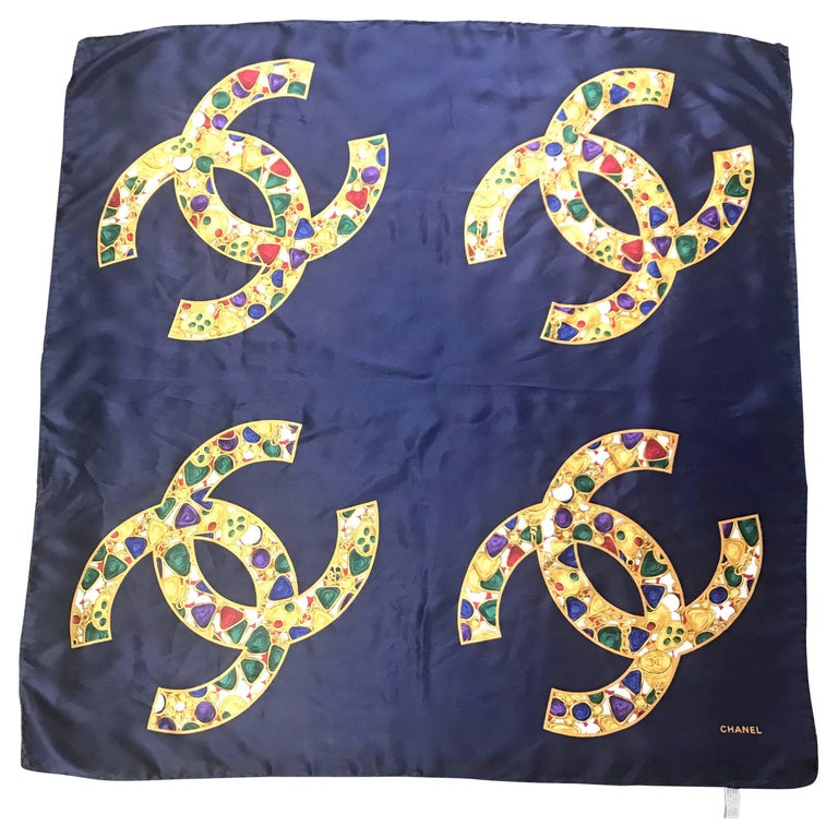 Vintage CHANEL navy silk scarf with gold, red, purple, green jewelry print  in CC at 1stDibs