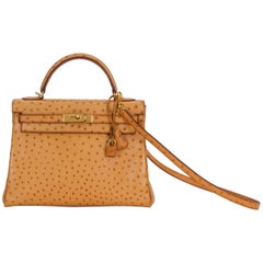 Hermès Kelly Pochette Mykonos Ostrich Gold Hardware GHW