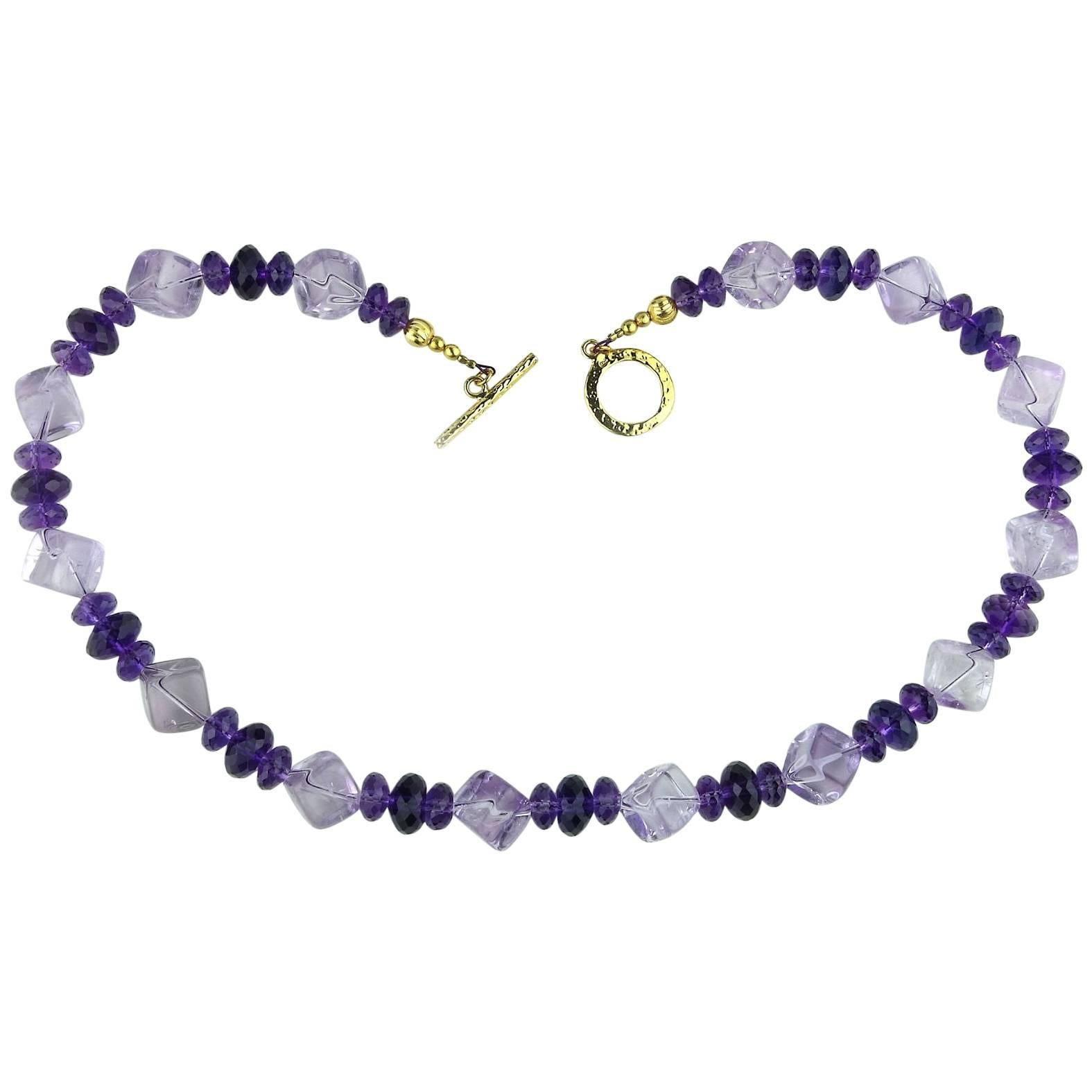 Two tones of Sparkling Amethyst necklace.  Beautifully polished cubes of lilac tone corner to corner strung Amethyst combined with deeper toned flashing faceted Amethyst rondels in two sizes.  This 18.5 inch necklace is finished with a vermeil