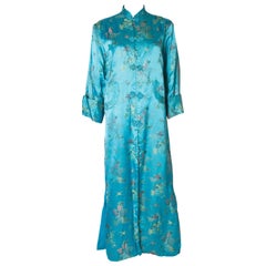 A 1960s Vintage Turquoise chinese satin embroidered evening Coat