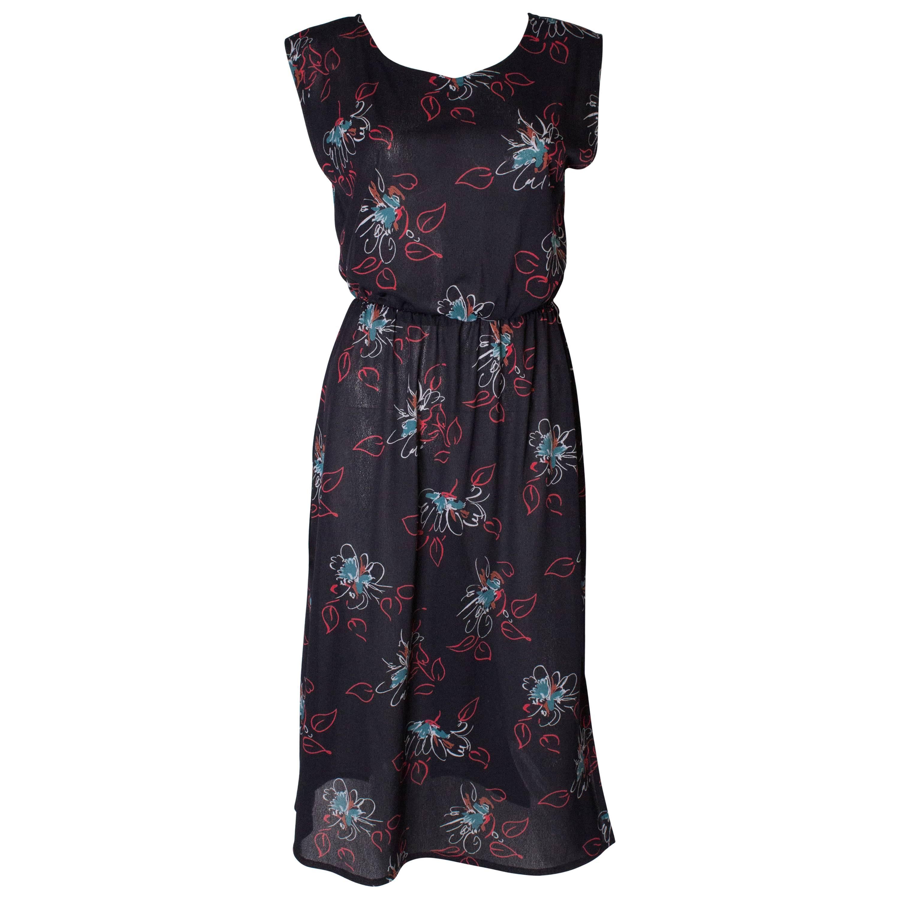 A vintage 1970s abstract floral printed Shift day Dress For Sale