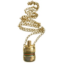 MINT. Retro Gucci golden mini perfume, eau de cologne bottle chain necklace.