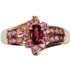 Anillo moderno STS de oro de 14 quilates con turmalina rosa intenso y piedras preciosas rosa claro
