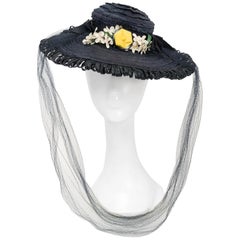 Sombrero de rafia tejida azul marino, años 40